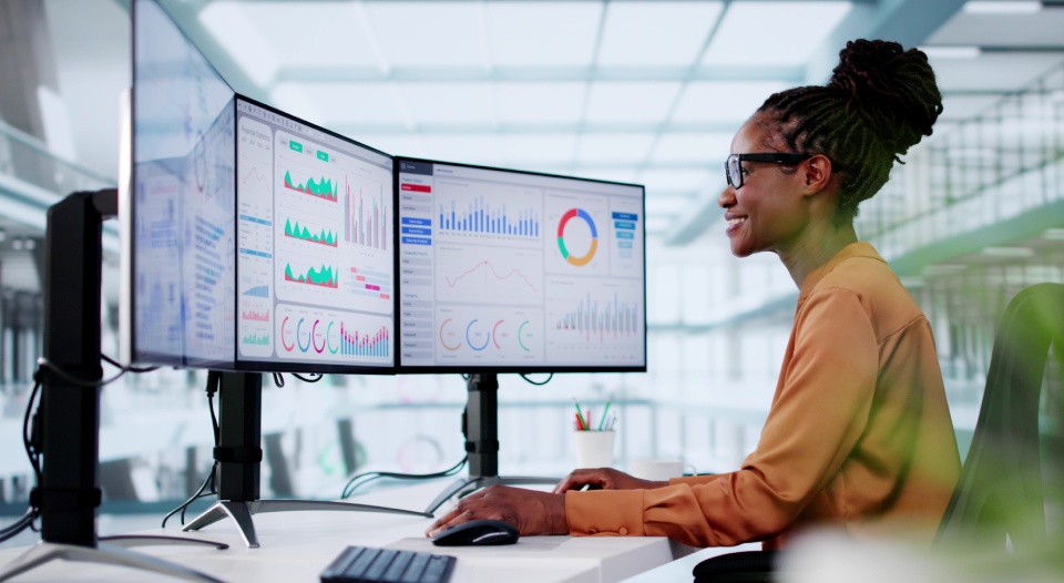 KPI Business Analytics Data Dashboard. Analyst Using Computer